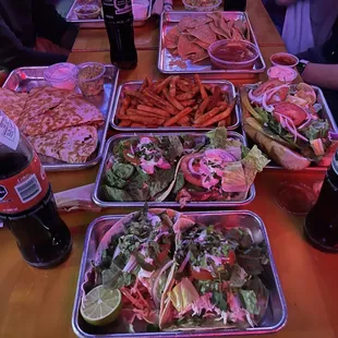 Blackened tilapia tacos, grilled jumbo shrimp tacos, fried jumbo shrimp po&apos;boy, vegetarian quesadillas