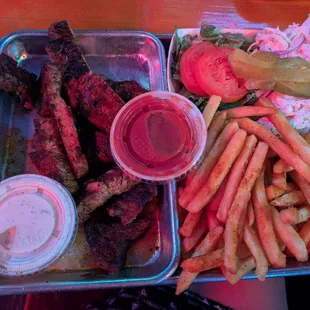 Blackened ribeye with Cajun fries