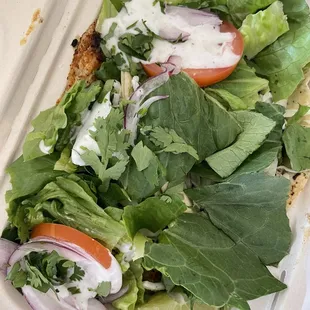 Grouper tacos under all those toppings!