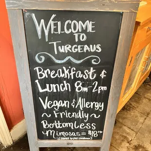 a chalkboard sign for breakfast and brunch
