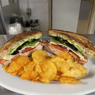 E's. T. A.  Turkey & avocado sandwich. Side of ZAPP'S chips included.