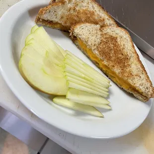 George Lee's Grilled cheese with a side of fruit.