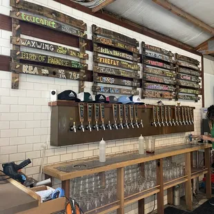a row of beer taps