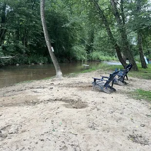 Outdoor seating area by the water.