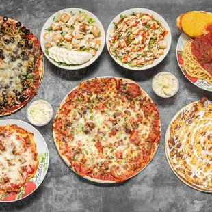 Indulge in our delicious spread of pizza, pasta, fresh salads, hearty sandwiches, &amp; a sweet slice of dessert pizza to top it all off!