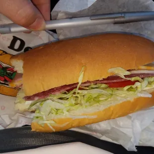 a sub sandwich in a wrapper