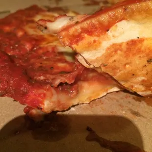 This is raw dough. 1/4  of it didn't have cheese. Ps this is a CHEESE pizza