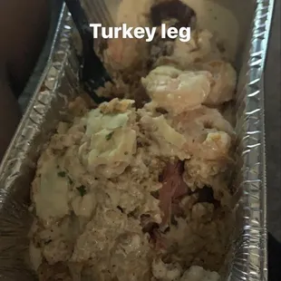Turkey Leg , Shrimp, Alfredo Sauce, and Cajun Rice.