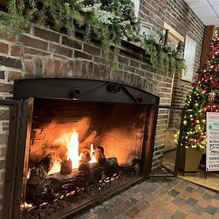 Cozy fireplace in communal lounge.
