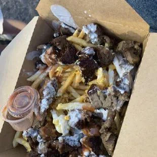 Loaded fries with gyro meat and feta (I believe it's called Loaded Fries Beef Donner)