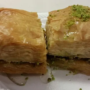 two pieces of baklai on a paper plate