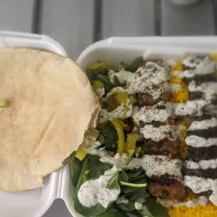 a meal in a styrofoam container