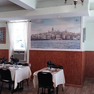 That&apos;s where I sat, under that poster or painting of a famous part of Istanbul.