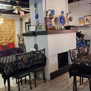 a dining room with a fireplace