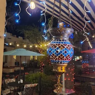 a patio area at night