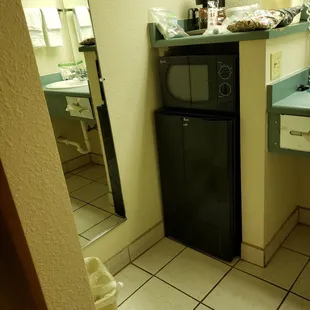 Real coffee cups. Coffee maker, fridge microwave