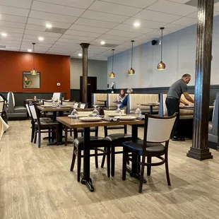 a man setting a table