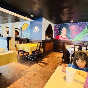 a child sitting at a table