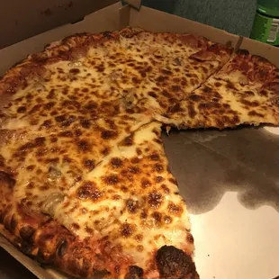 a half eaten pizza in a box