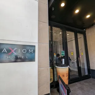 Outside. Storefront. Powell Street entrance. Located inside the Axiom Hotel.