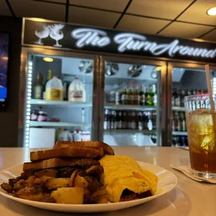 a plate of food and a drink