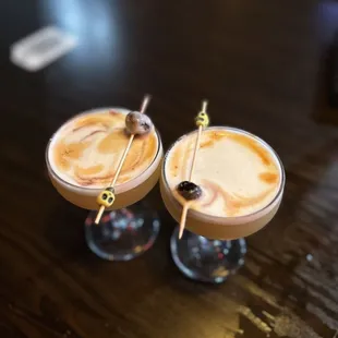 two cocktails on a table