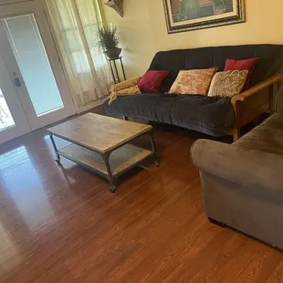 The living room was perfect size and the sofa super comfortable and big, in the picture doesn't look very big but it is.