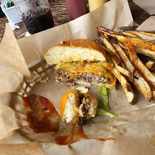 Cheeseburger and fries. Excellent. Again, it&apos;s half eaten because we were starving. Lol