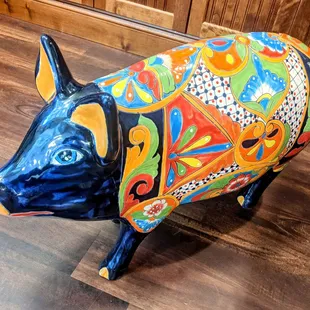 a colorful painted pig