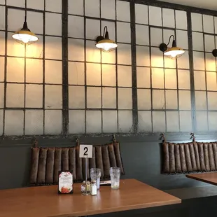 New seating area with new benches and lighting courtesy of Restaurant Impossible