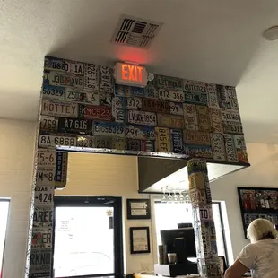 Inside the front entrance - assorted license plates
