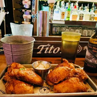 8 Korean fried chicken wings (half/half soy garlic and spicy) with a bottle of Two Hearted Ale beer during their daily Happy Hour deals.