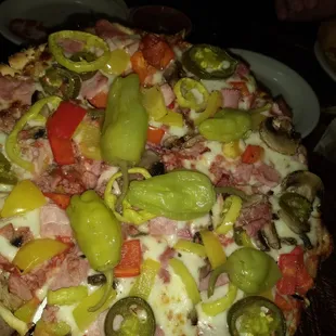 Small Pepper Planet thin crust pizza.