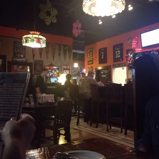 Bar area. Don&apos;t wait for seating if your party is over 21, pop in here
