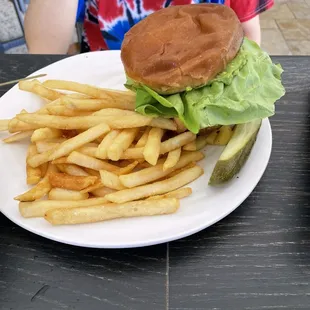 Swordfish sandwich with fries.