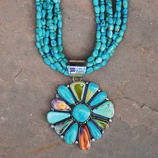 A true statement piece with three types of turquoise.