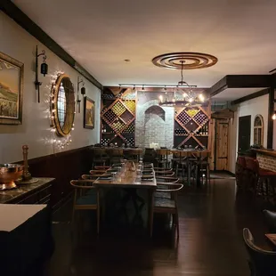 a dining room with tables and chairs