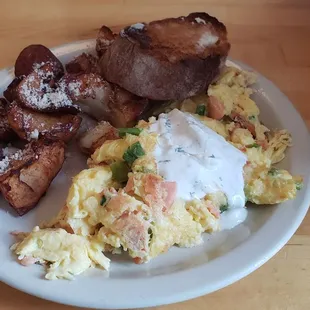 a plate of eggs and bacon