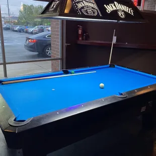 a pool table in a restaurant