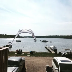 a view of a boat dock and a sailboat