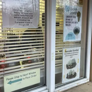 a window with a sign in the window