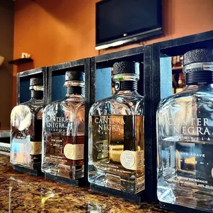 a row of liquor bottles