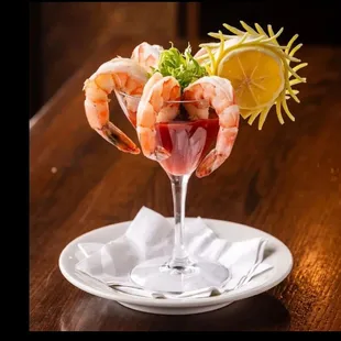 a shrimp cocktail in a wine glass