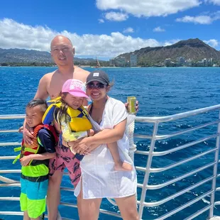 Cruising on the boat with views of Diamond head after swimming with sea turtles.