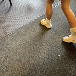 a person walking on the floor