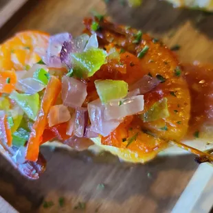 a close up of a slice of pizza