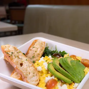 a meal in a styrofoam container