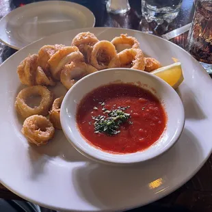 Calamari that is soggy looking like it&apos;s heated in the microwave. Disgusting and pathetic.