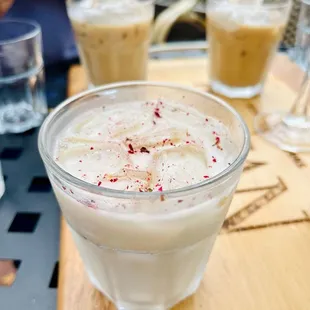 Iced latte with crushed rose petals