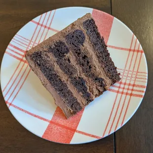 I love the Hunka Burnin Love cake, a dense buttermilk chocolate 4-layer cake with chocolate buttercream frosting.
